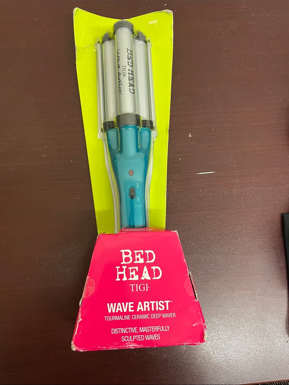 Bed Head packaging in lime green and hot pink